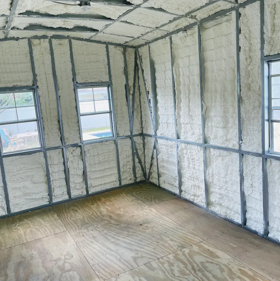 Closed-cell spray foam insulation applied to wall cavities in a residential project in Huntington